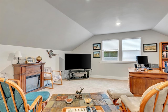 interior space featuring baseboards and lofted ceiling