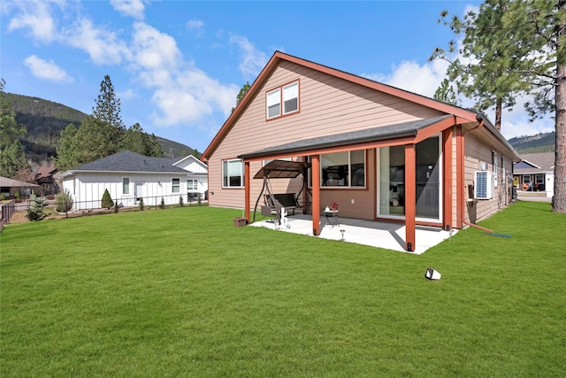 11469 Ninebark Way, Missoula, MT 59802 - back of house featuring a patio and a mountain view