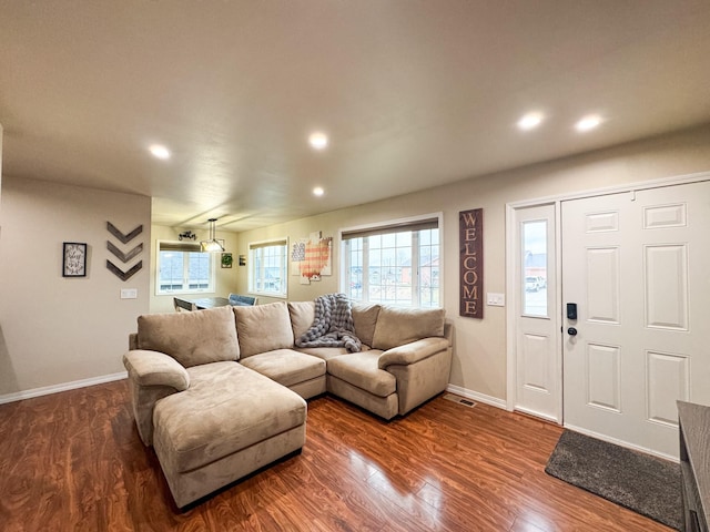 8626 Snapdragon Dr, Missoula, MT 59808 - living room featuring recessed lighting and dark wood-type flooring