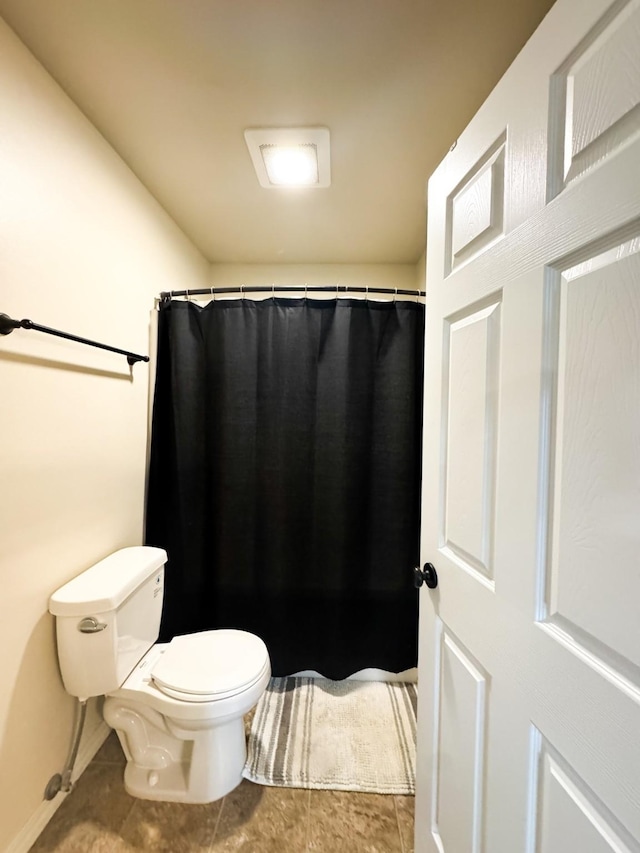 8626 Snapdragon Dr, Missoula, MT 59808 - full bathroom featuring tile patterned flooring and a shower with shower curtain