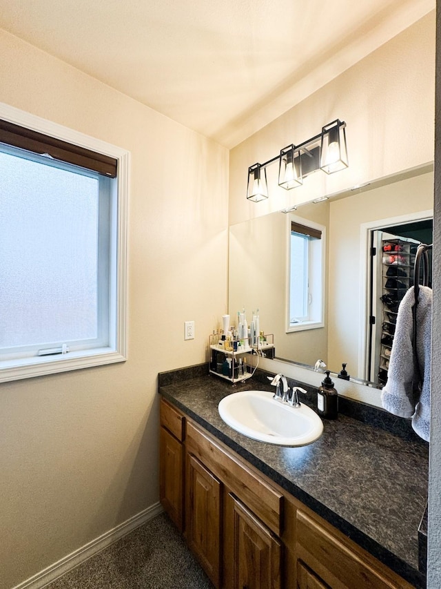 8626 Snapdragon Dr, Missoula, MT 59808 - bathroom with vanity and baseboards