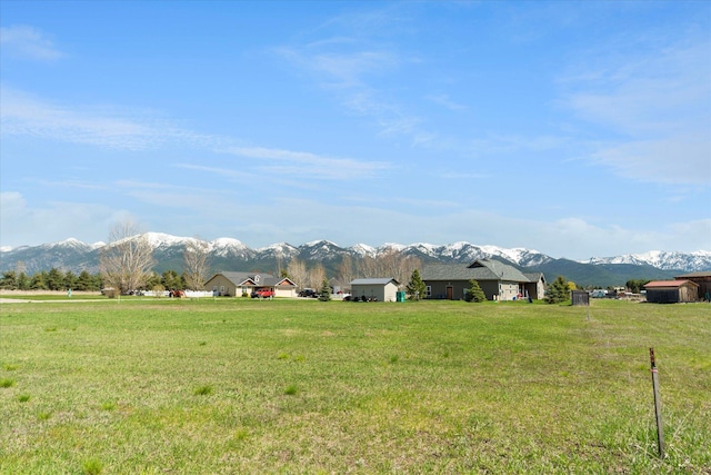 view of mountain feature with a rural view
