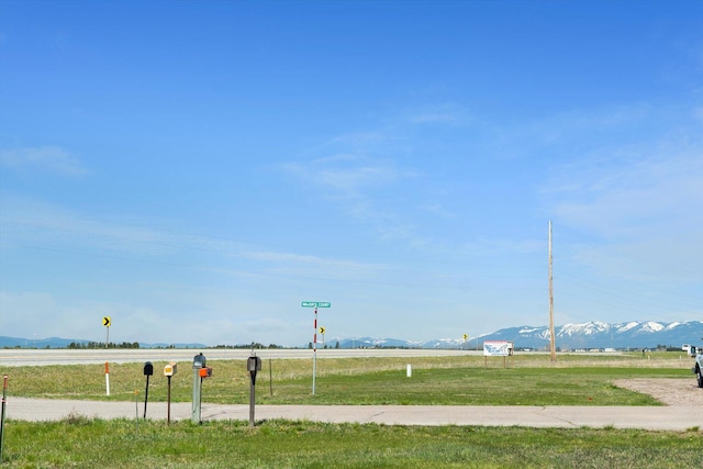 view of property's community featuring a rural view and a mountain view