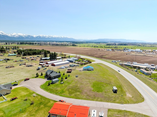 drone / aerial view featuring a rural view and a mountain view
