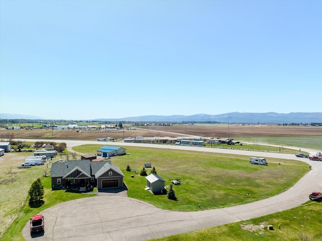 bird's eye view featuring a mountain view and a rural view