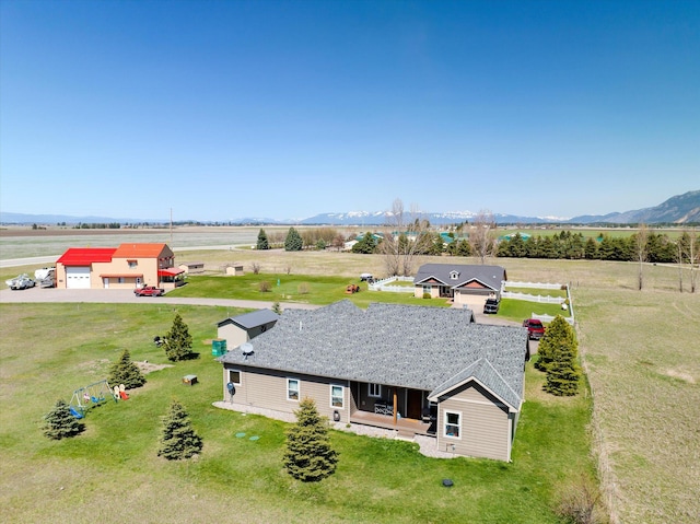 bird's eye view with a mountain view and a rural view