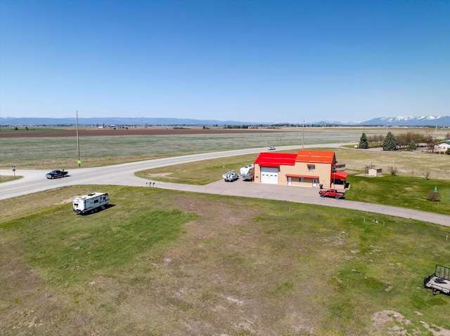birds eye view of property featuring a rural view and a mountain view