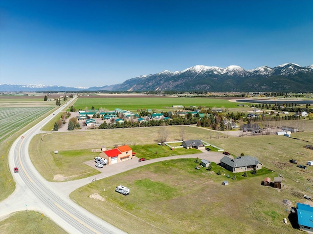 aerial view featuring a mountain view and a rural view