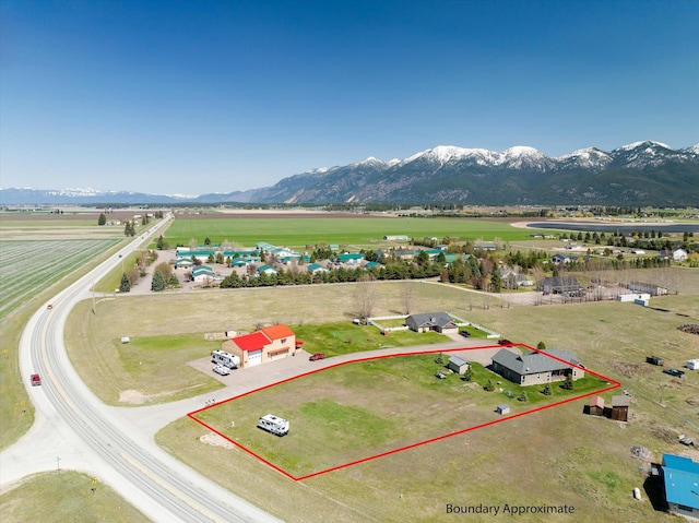 aerial view featuring a mountain view and a rural view