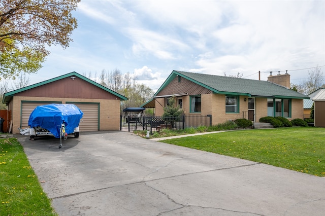 1317 River Rd, Missoula, MT 59801 - view of front facade featuring brick siding, an outdoor structure, a chimney, and a detached garage