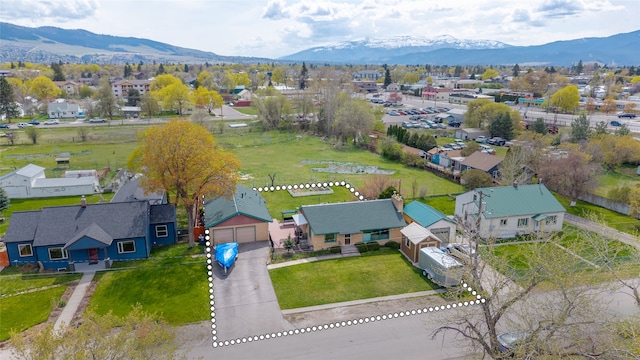 drone / aerial view with a mountain view and a residential view