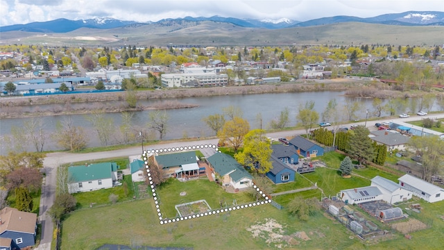 aerial view featuring a residential view and a water and mountain view