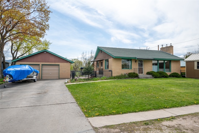 ranch-style home with a chimney, a front yard, a detached garage, brick siding, and fence