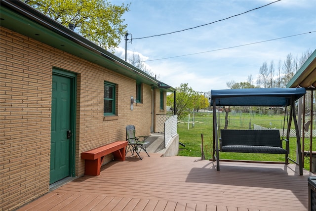 1317 River Rd, Missoula, MT 59801 - wooden deck with a lawn