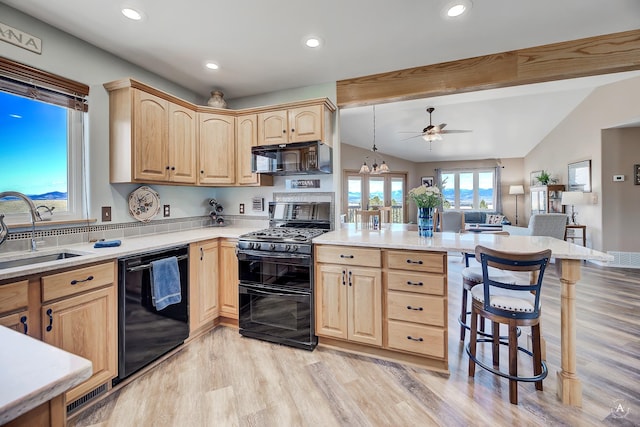 kitchen with vaulted ceiling with beams, a sink, light brown cabinetry, and black appliances