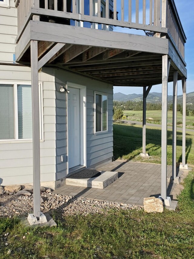 3 Brow Tine Blvd, Clancy, MT 59634 - view of patio featuring a deck with mountain view