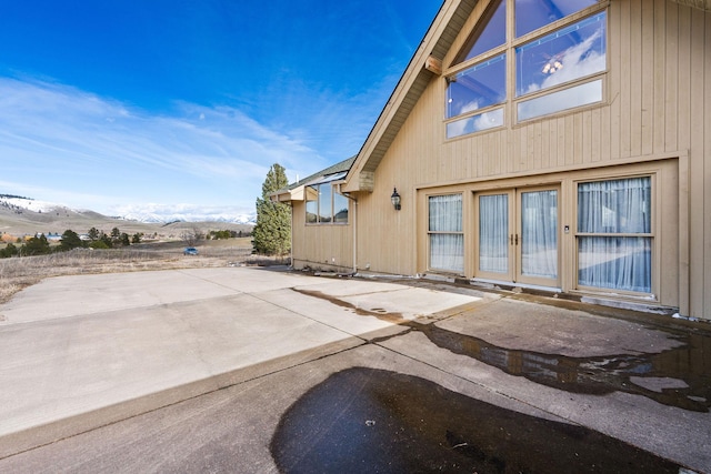 exterior space featuring a mountain view