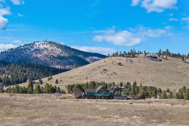 view of mountain feature with a rural view