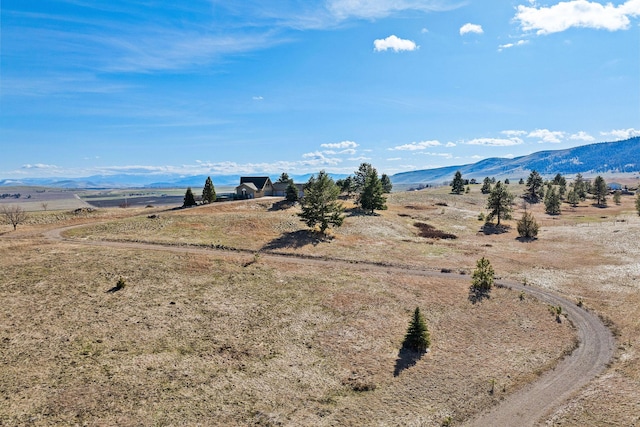 view of mountain feature with a rural view