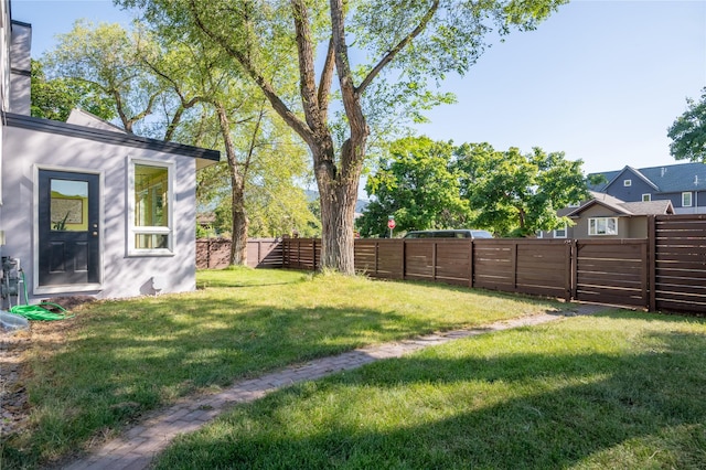 view of yard featuring a fenced backyard