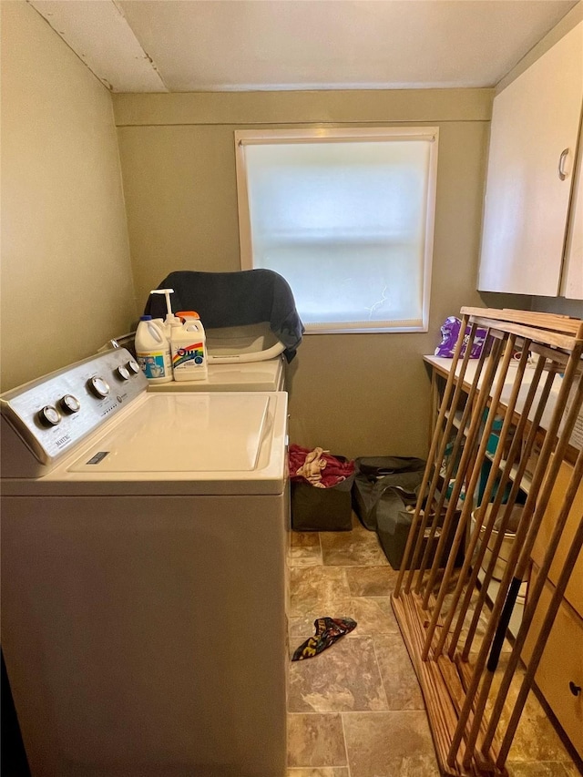 clothes washing area with laundry area and washer and clothes dryer