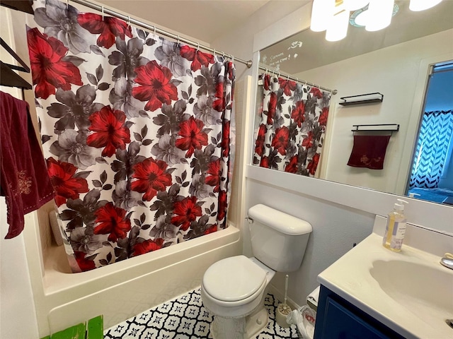 bathroom featuring toilet, shower / bathtub combination with curtain, and vanity