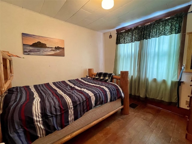 bedroom featuring hardwood / wood-style flooring