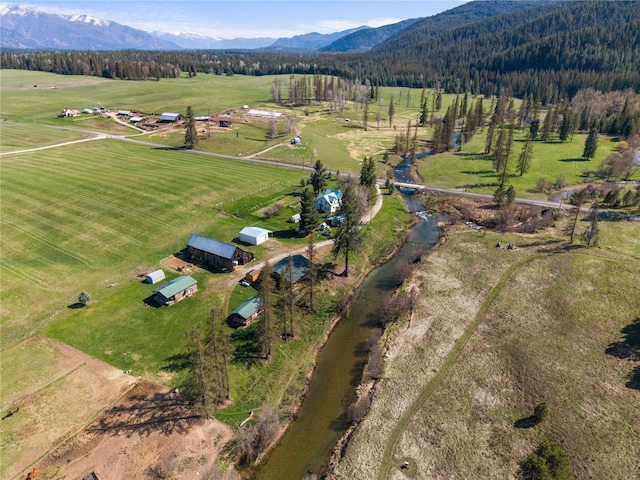 drone / aerial view featuring a rural view and a mountain view