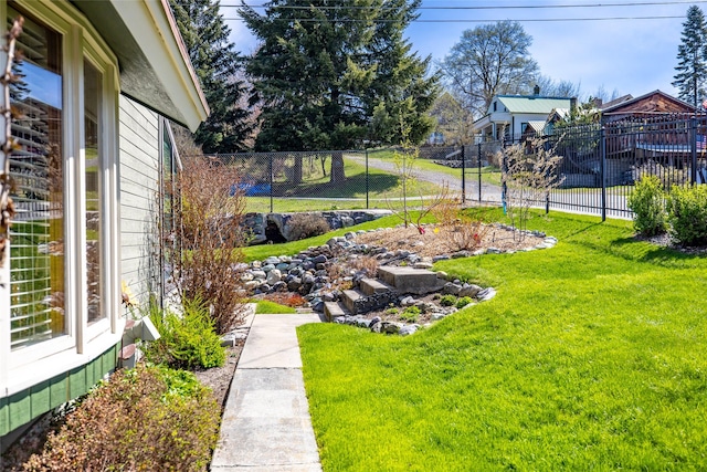 view of yard with fence