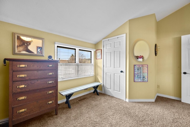 bedroom featuring carpet flooring, baseboards, and lofted ceiling