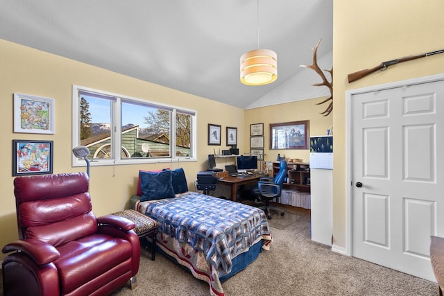 bedroom with vaulted ceiling and carpet