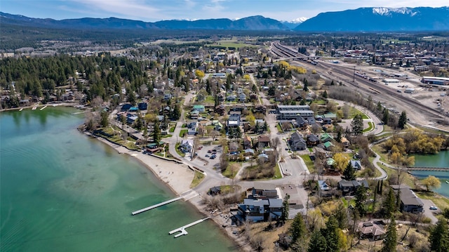 aerial view featuring a residential view and a water and mountain view