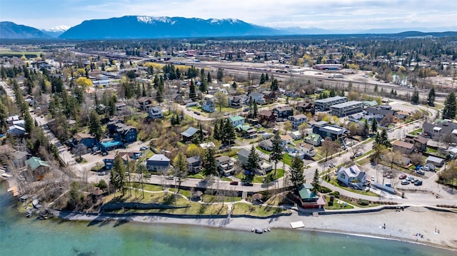 bird's eye view with a residential view and a water and mountain view