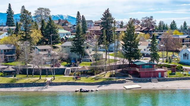 aerial view with a residential view and a water view