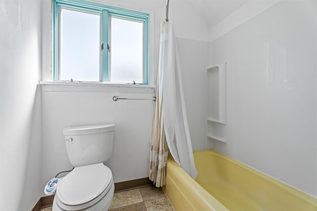 226 S Davis St, Missoula, MT 59801 - full bathroom with baseboards, shower / bath combo, and toilet