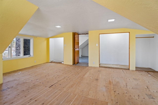 226 S Davis St, Missoula, MT 59801 - bonus room featuring vaulted ceiling and hardwood / wood-style flooring