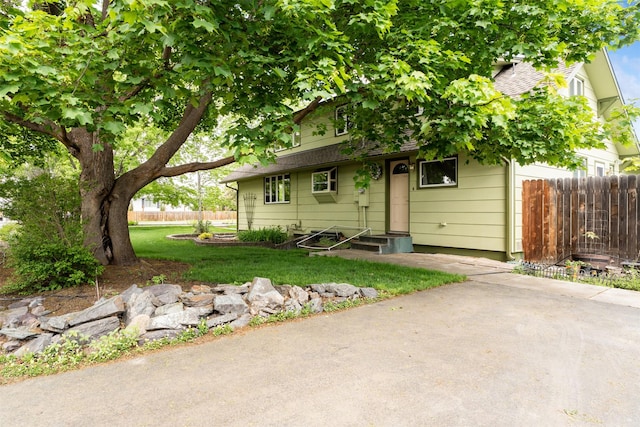 226 S Davis St, Missoula, MT 59801 - view of front of house with entry steps and roof with shingles