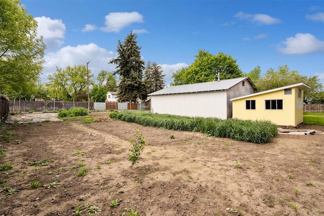 226 S Davis St, Missoula, MT 59801 - view of yard featuring an outbuilding