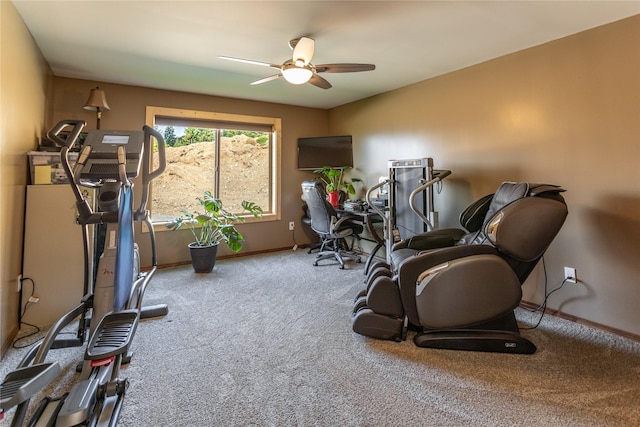 workout room with carpet floors, baseboards, and a ceiling fan