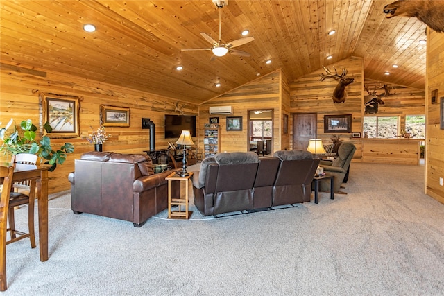 carpeted living area with wooden walls, wood ceiling, a ceiling fan, and a wealth of natural light