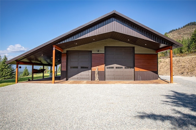 view of front of home with an outbuilding and a detached garage