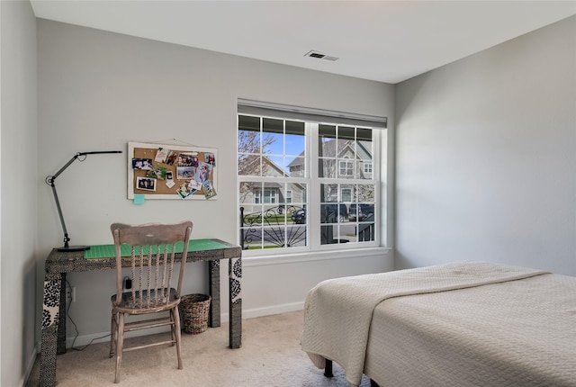 bedroom with carpet floors, multiple windows, baseboards, and visible vents