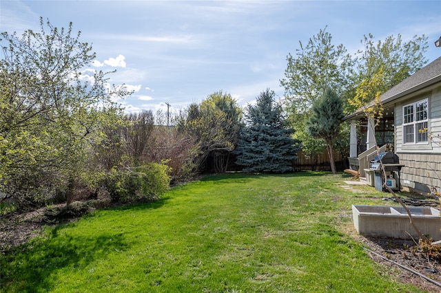 view of yard featuring fence
