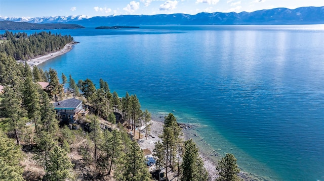 bird's eye view featuring a water and mountain view
