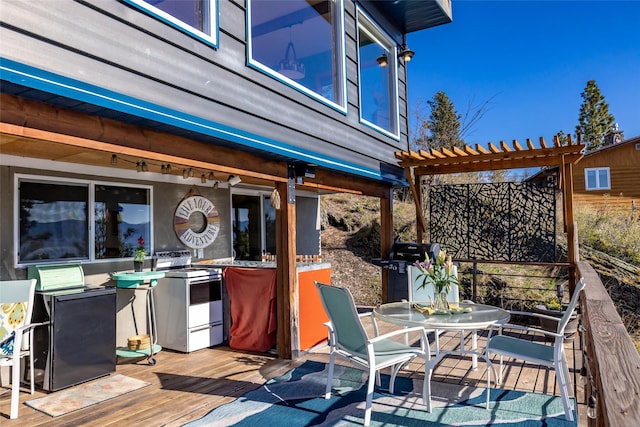 wooden deck featuring outdoor dining area, grilling area, and a pergola