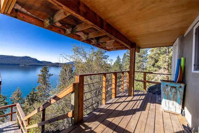 deck featuring a water view