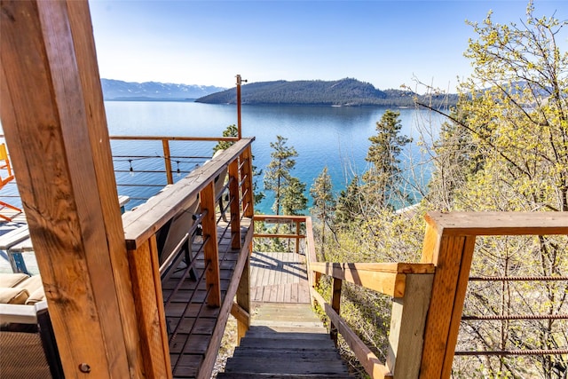 dock area featuring a water and mountain view