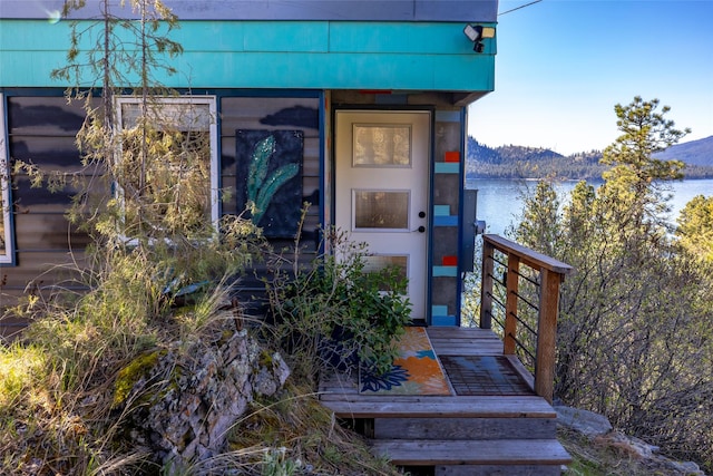 property entrance with a water view