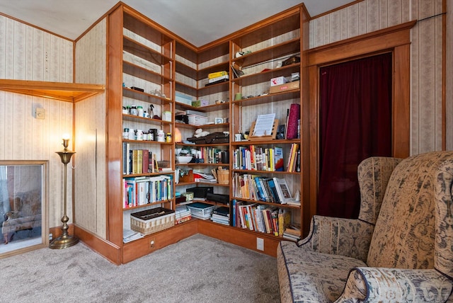 living area featuring carpet flooring and wallpapered walls