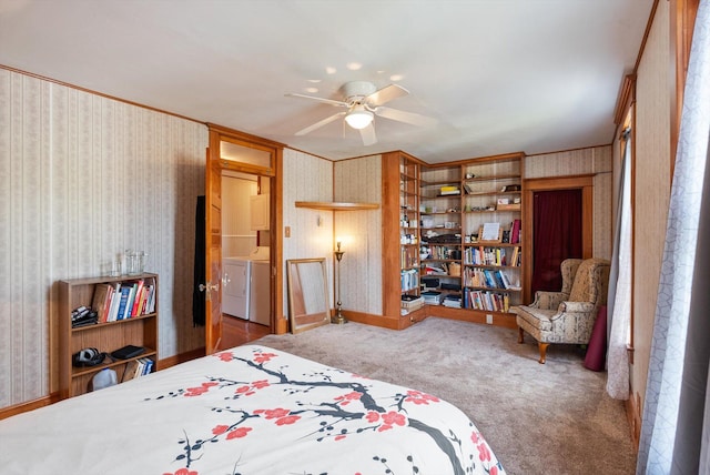 bedroom featuring baseboards, carpet, washing machine and dryer, and wallpapered walls